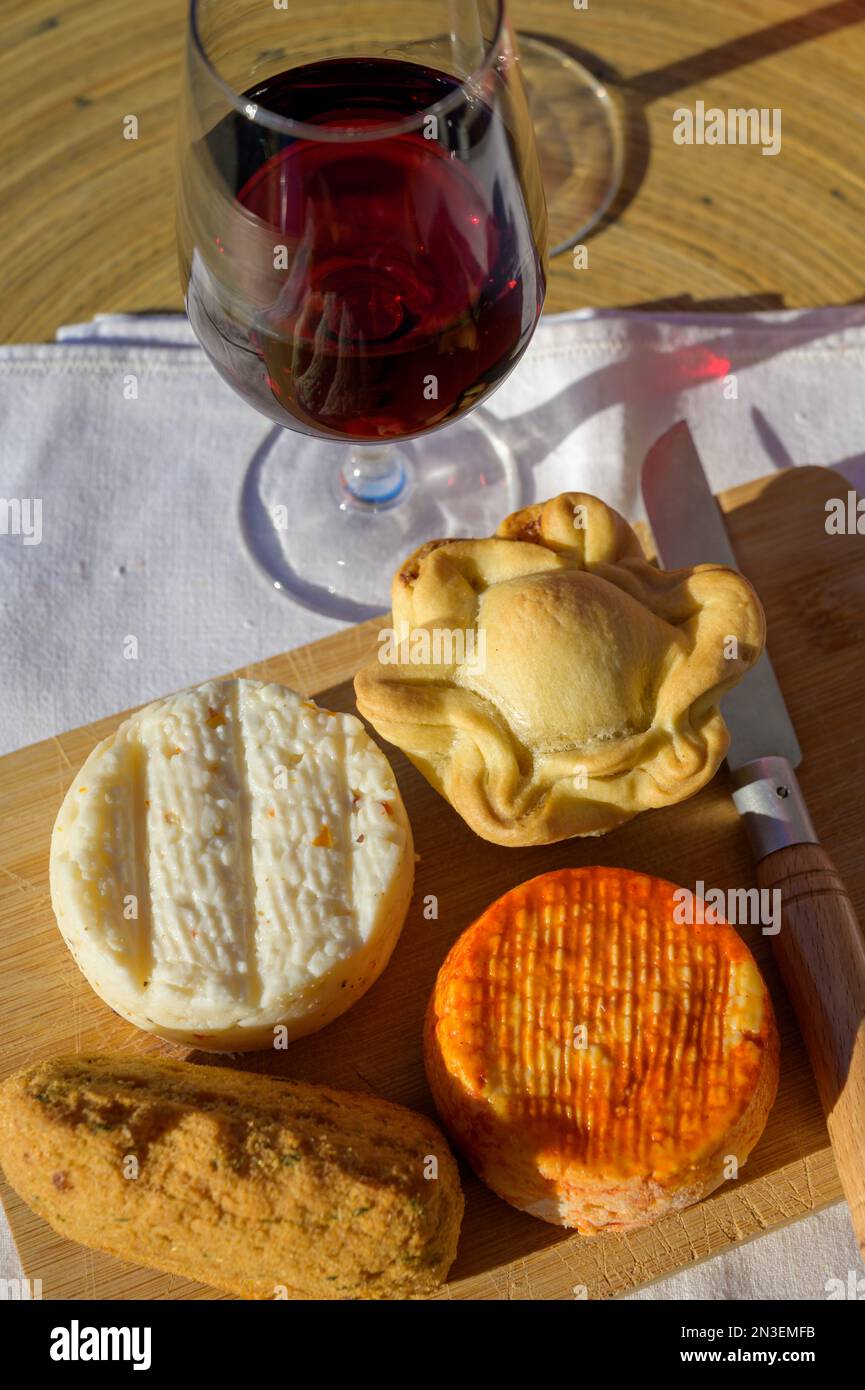 Portuguese Food And Drink Glass Of Tawny Porto Wine Codfish Croquette portuguese-food-and-drink-glass-of-tawny-porto-wine-codfish-croquette