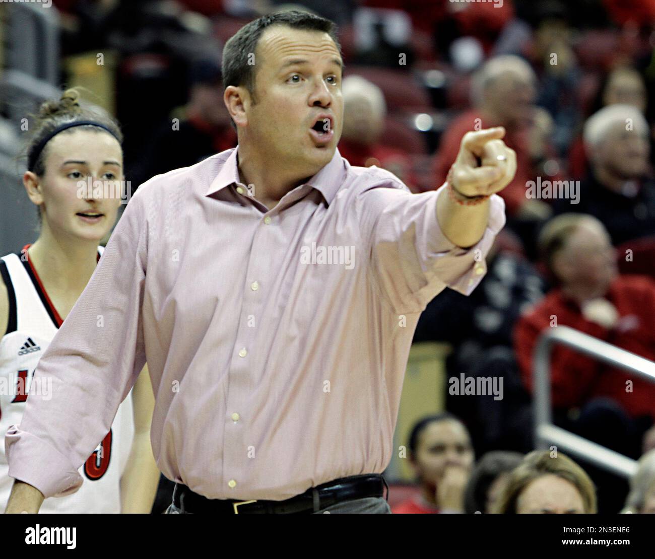 Louisville coach Jeff Walz gestures as he gives instructions to his
