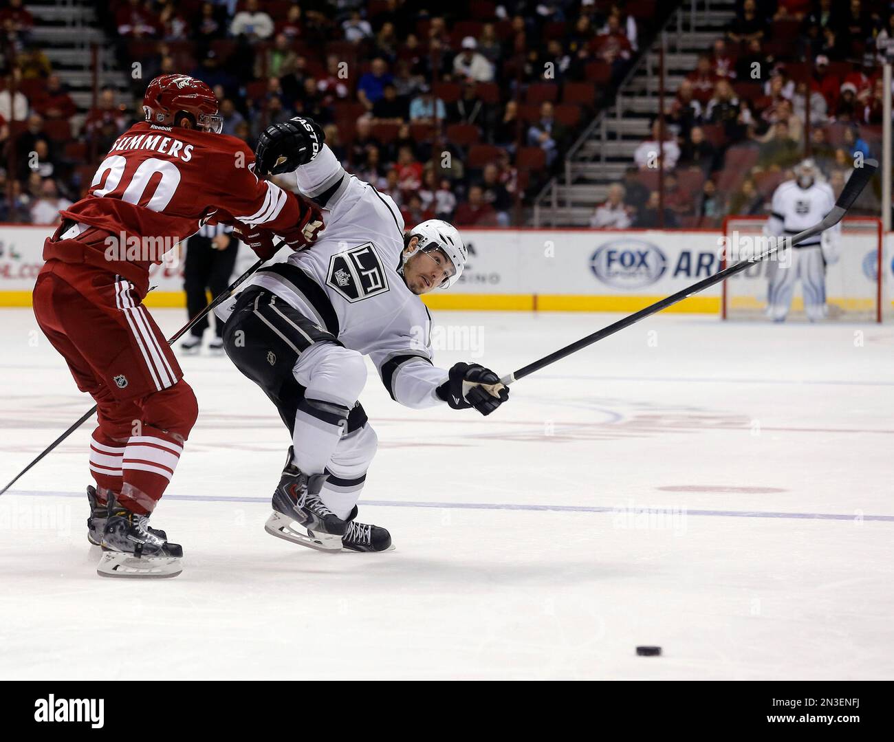 Arizona Coyotes Defenseman Chris Summers (20), Left, Separates Los ...