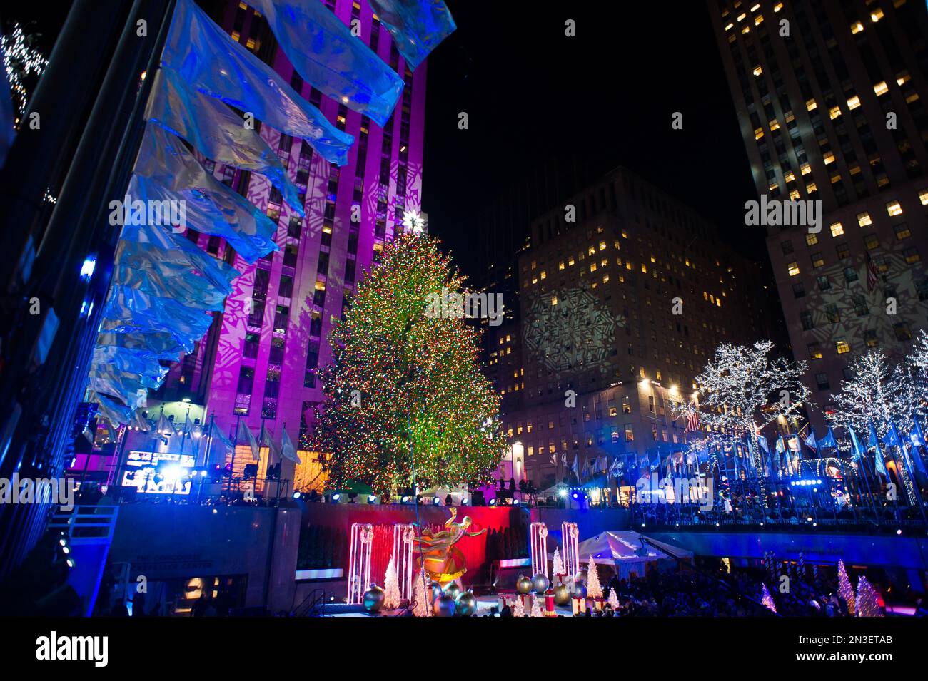 The Rockefeller Center Christmas tree is lit on Wednesday, Dec. 3, 2014