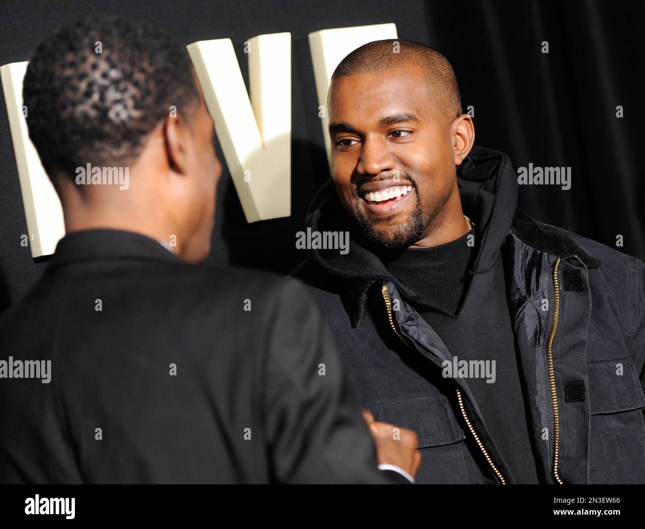 Actor/director Chris Rock, left, and co-producer Kanye West attend the ...