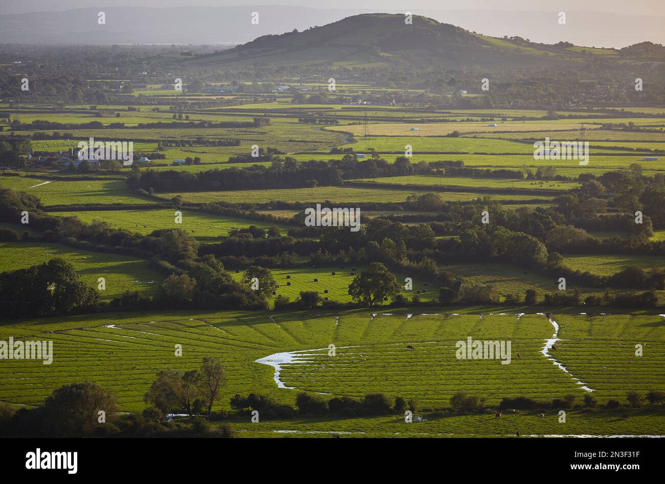 A view across the countryside of lush farmland from the slopes of Crook Peak; Somerset, England, Great Britain Stock Photo