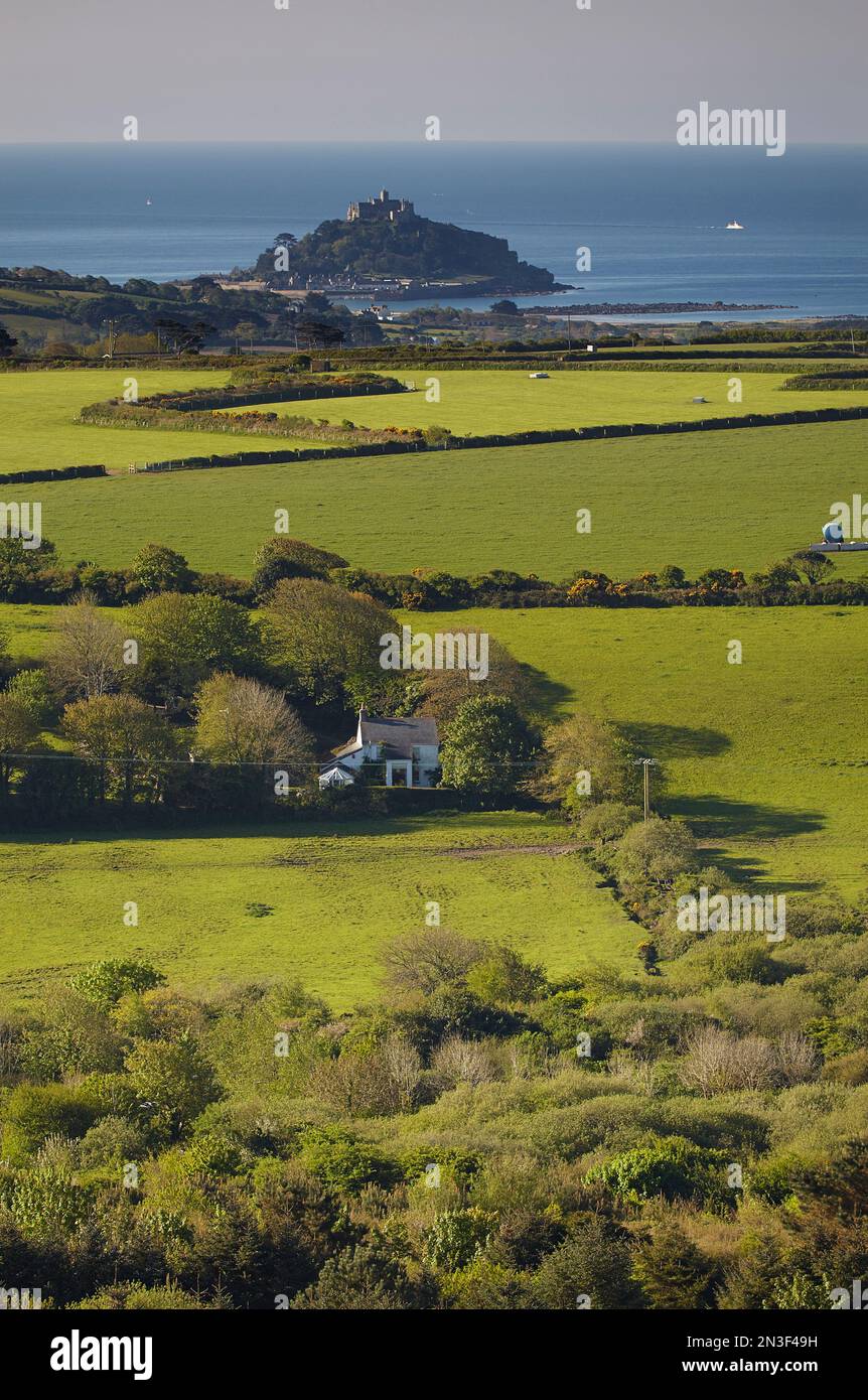 Green farmland and view of St Michael's Mount seen from Trencrom Hill