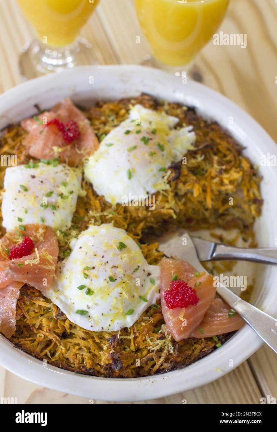 This Nov. 17, 2014 photo shows sweet potato and salmon hash bake in