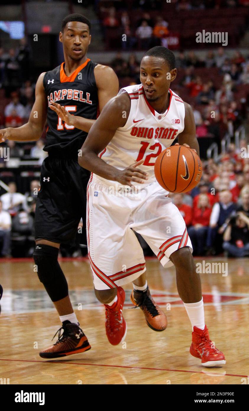 Ohio State's Sam Thompson, right, drives against Campbell's Curtis ...