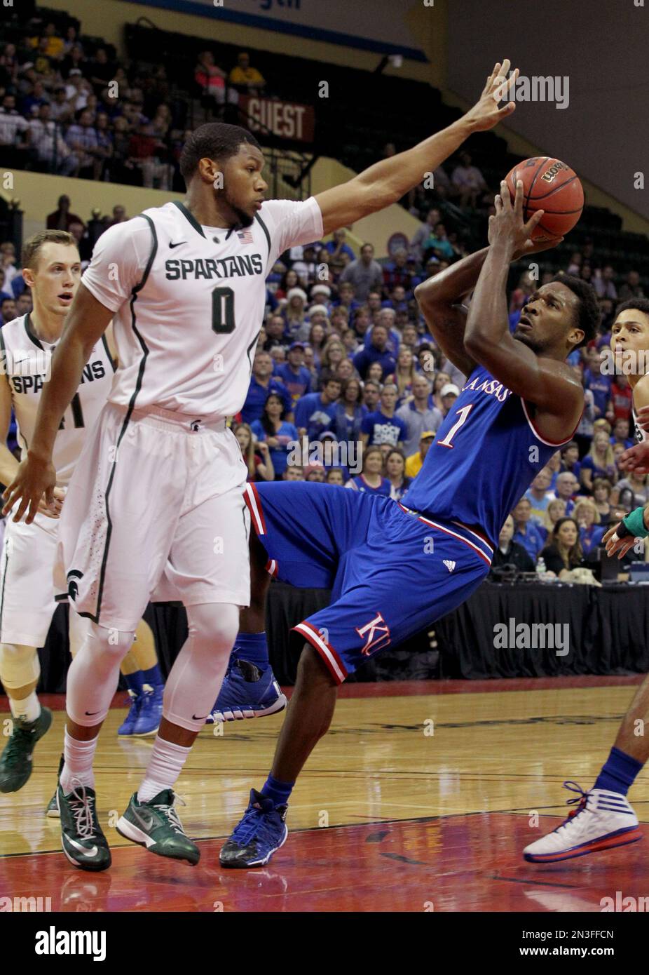 Michigan State forward Marvin Clark Jr. (0) guards against Kansas guard