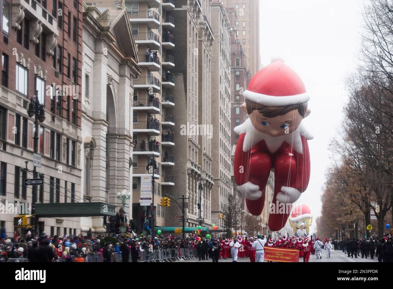 The Elf on the Shelf balloon floats in the Macy's Thanksgiving Day ...