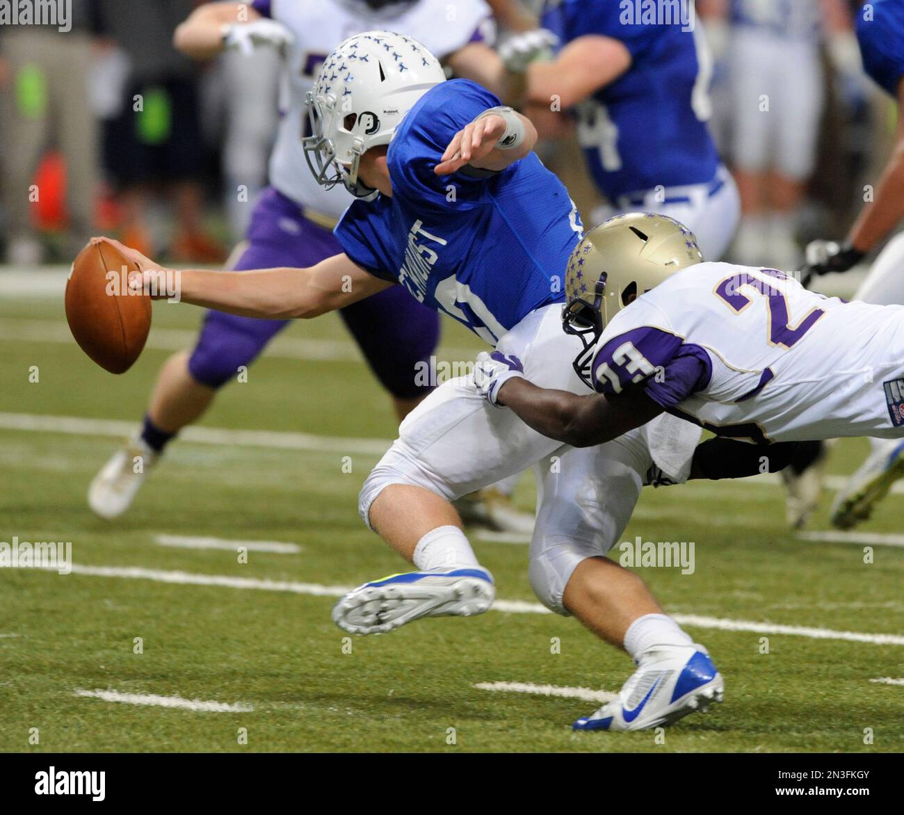 Christian Brothers College's Clayton Stalling (23) dives for Rockhurst