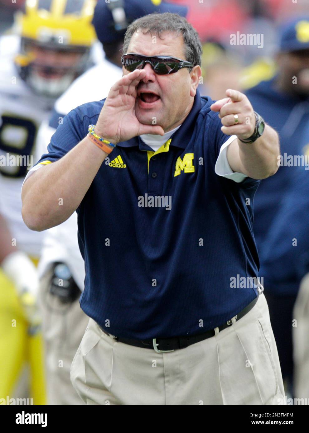Michigan head coach Brady Hoke shouts to his team as they play against