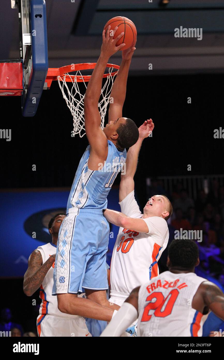 North Carolina's Brice Johnson (11) goes up for a dunk as Florida's