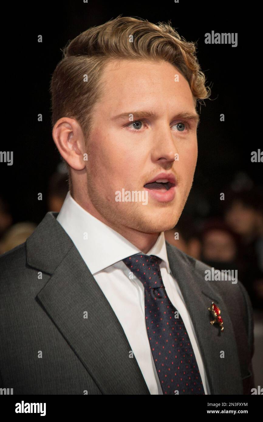 Actor Ross Anderson poses for photographers upon arrival at the