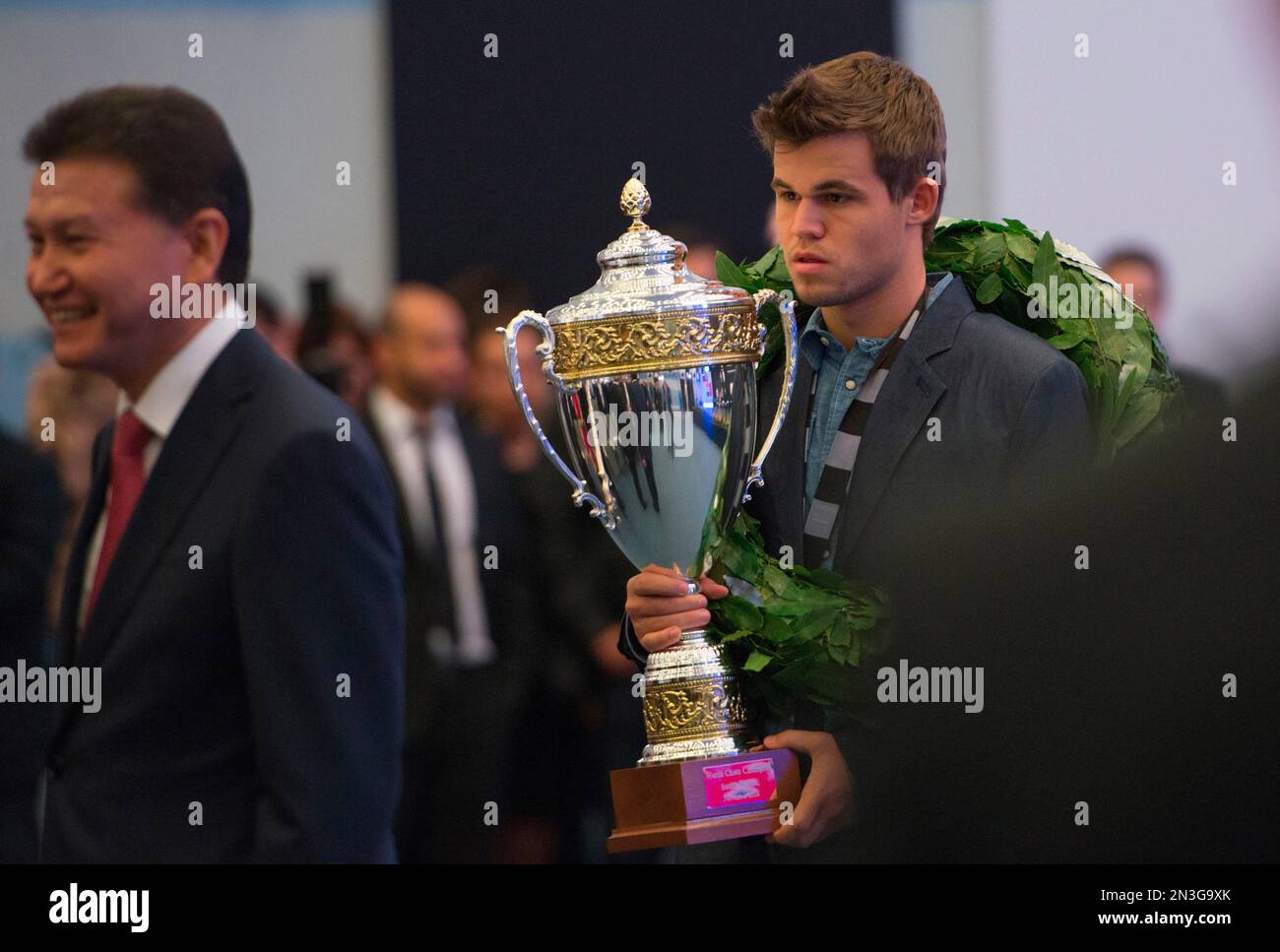 World chess champion Viswanathan Anand of India holds a trophy at an award  presentation ceremony of the FIDE World Chess Championship in Moscow,  Russia, Thursday, May 31, 2012. Anand oretained his title