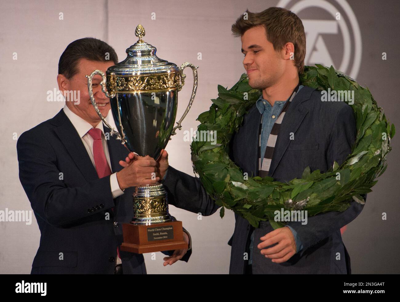 World chess champion Viswanathan Anand of India holds a trophy at an award  presentation ceremony of the FIDE World Chess Championship in Moscow,  Russia, Thursday, May 31, 2012. Anand oretained his title