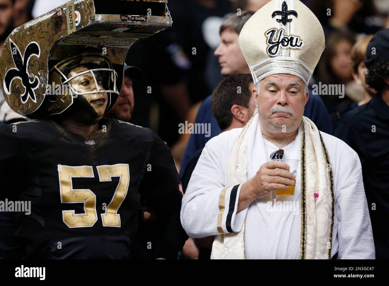 New Orleans Saints fans celebrate a 24-23 win over the Baltimore