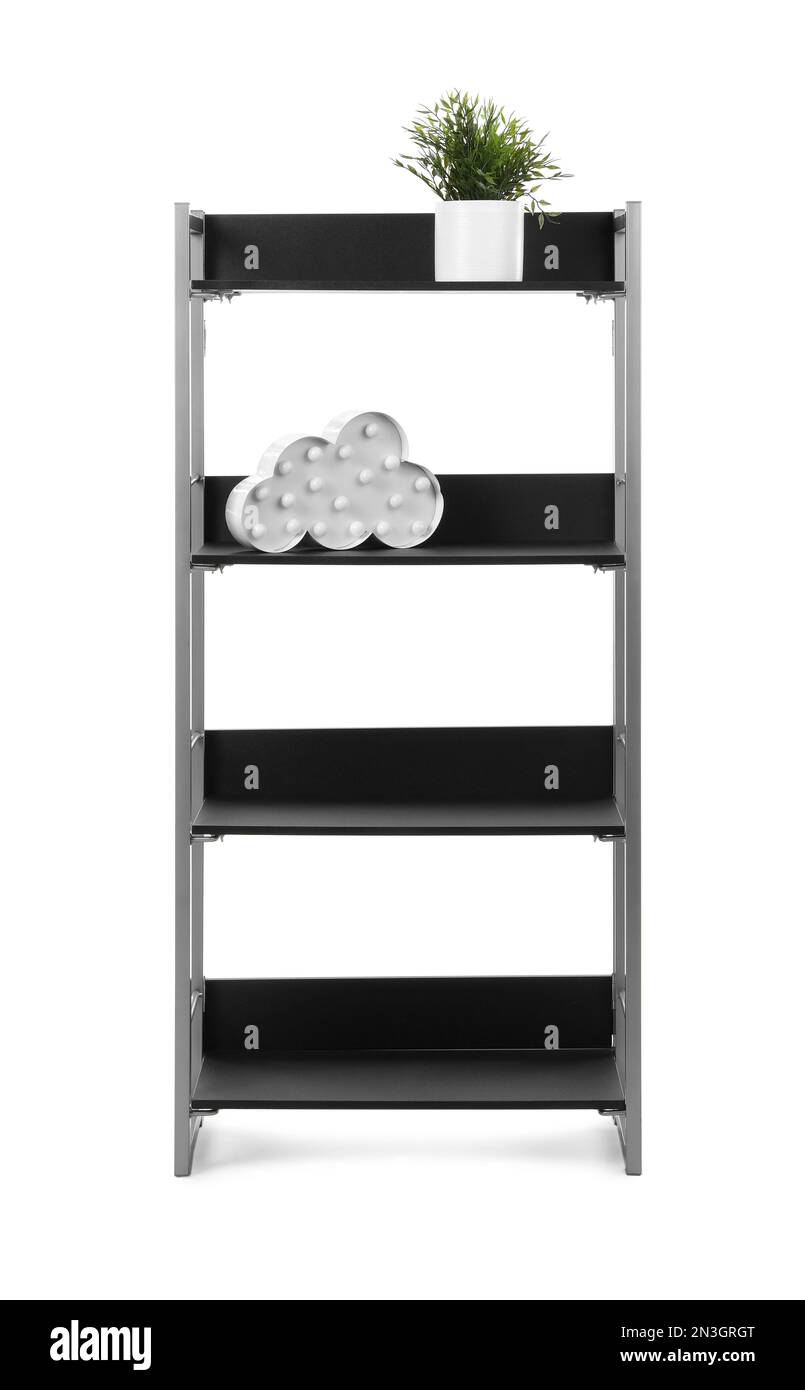 Stylish shelving unit with lamp and plant isolated on white Stock Photo ...