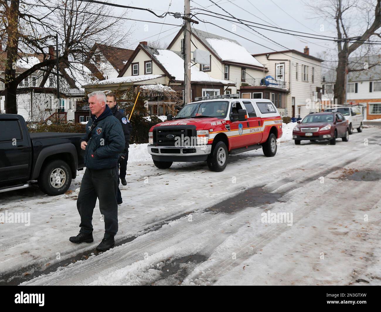 Yonkers Fire Department personnel survey houses in south Buffalo, N.Y