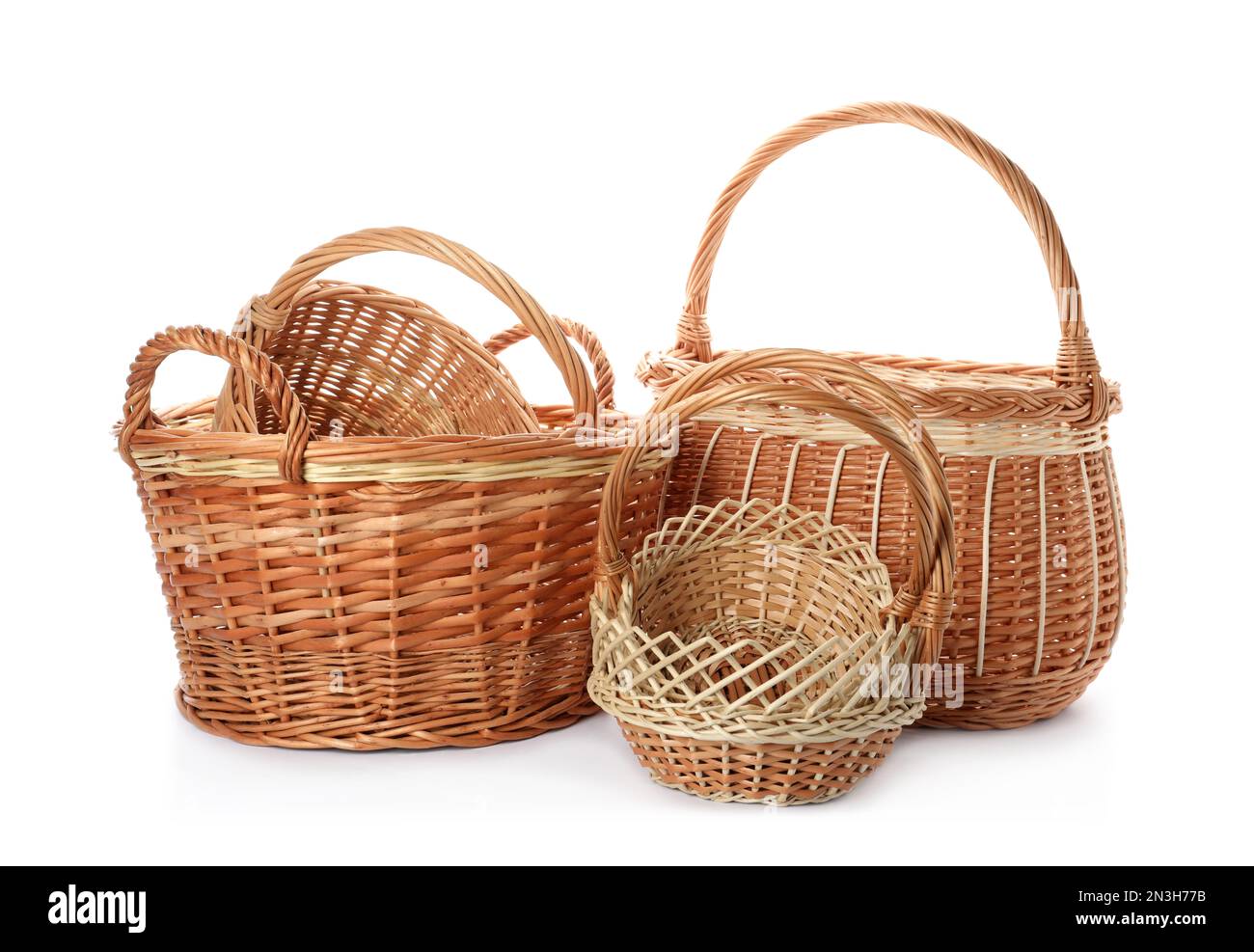 Many decorative wicker baskets on white background Stock Photo Alamy