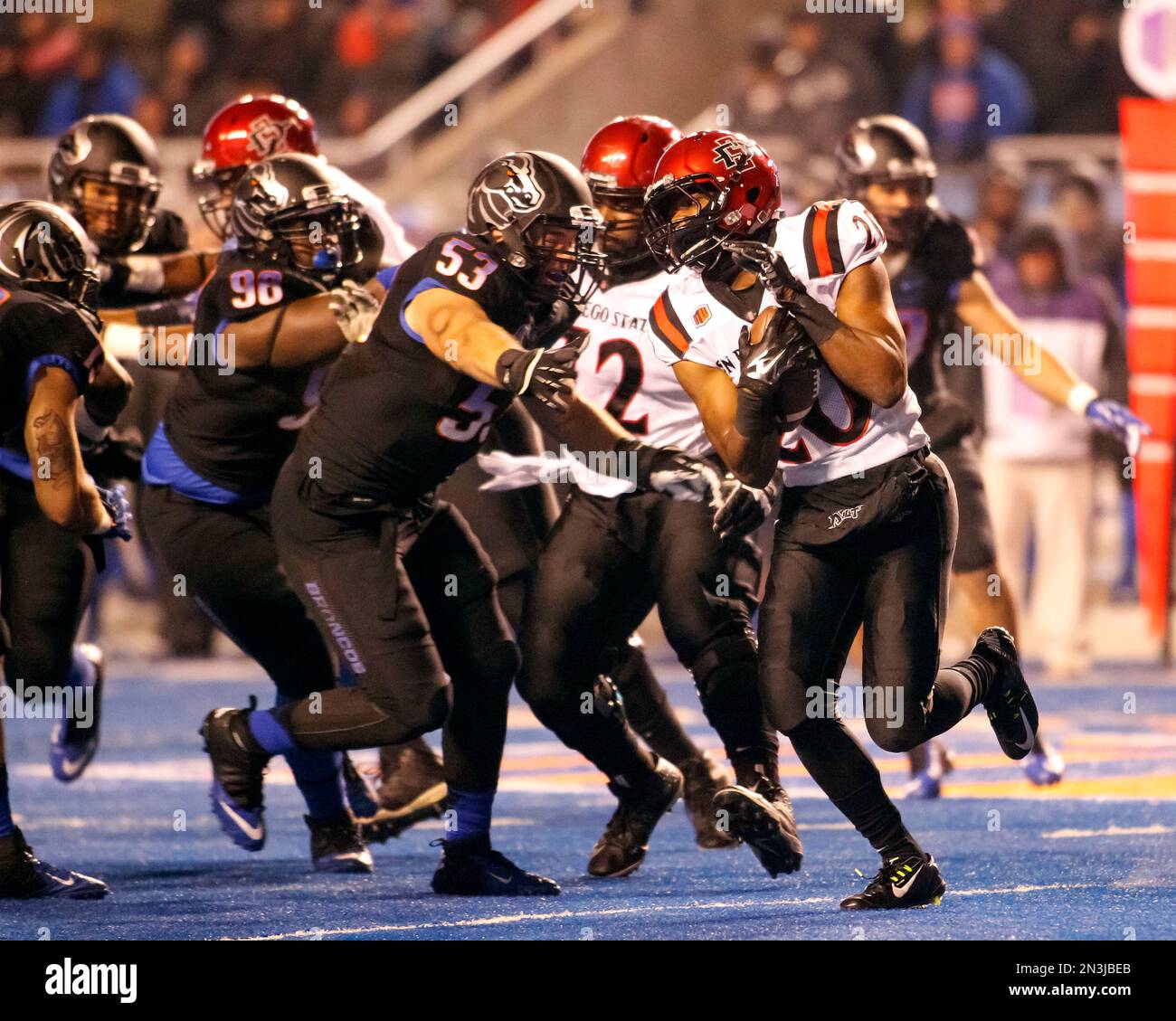 San Diego State running back Rashaad Penny, right, carries the ball ...