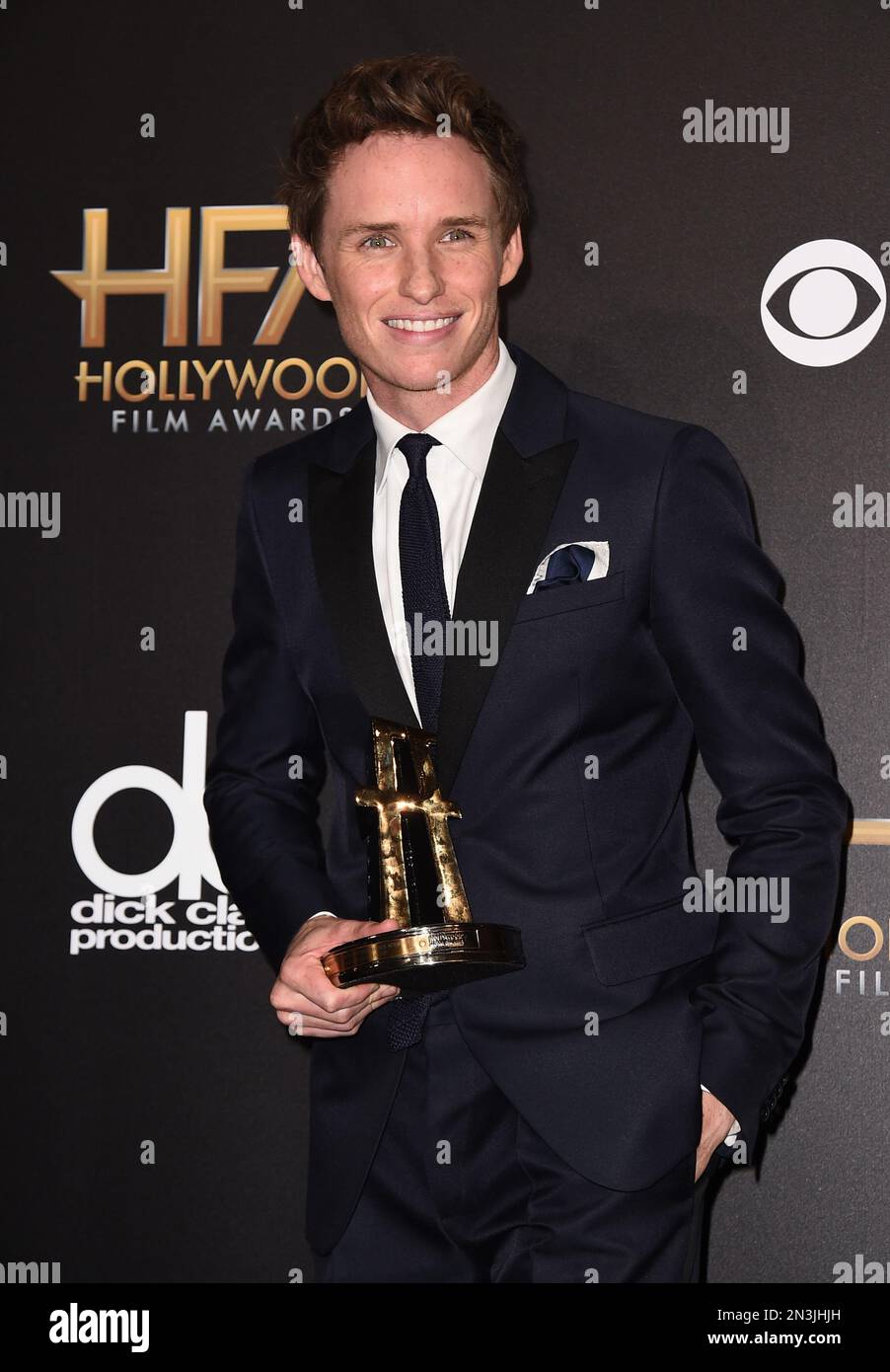 Eddie Redmayne poses in the press room with the Hollywood breakout
