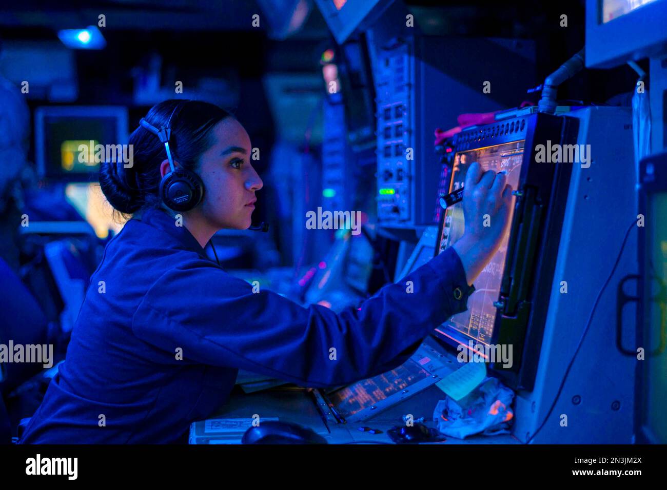 South China Sea. 1st Feb, 2023. U.S. Navy Operations Specialist 1st Class Nancy Ayala, from Orange Cove, Calif., stands watch in the combat information center aboard the Arleigh Burke-class guided-missile destroyer USS Wayne E. Meyer (DDG 108). Wayne E. Meyer, part of the Nimitz Carrier Strike Group, is in U.S. 7th Fleet conducting routine operations. 7th Fleet is the U.S. Navys largest forward-deployed numbered fleet, and routinely interacts and operates with Allies and partners in preserving a free and open Indo-Pacific region. (Credit Image: © U.S. Navy/ZUMA Press Wire Service/ZUMAPRES Stock Photo