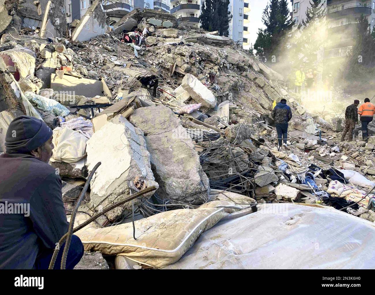 Adiyaman, Turkey. 11th Feb, 2023. People watch the wreckage of collapsed  buildings. It has been 6 days since the earthquake that hit Turkey and  Syria. In the earthquake, in which more than