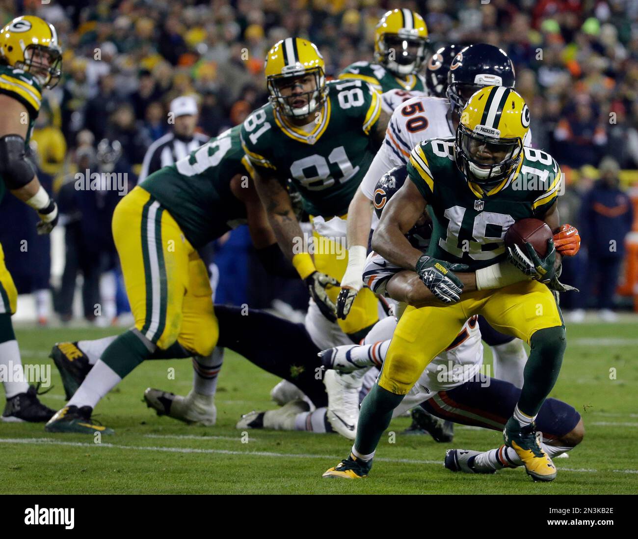 Green Bay Packers wide receiver Randall Cobb (18) is stopped by Chicago
