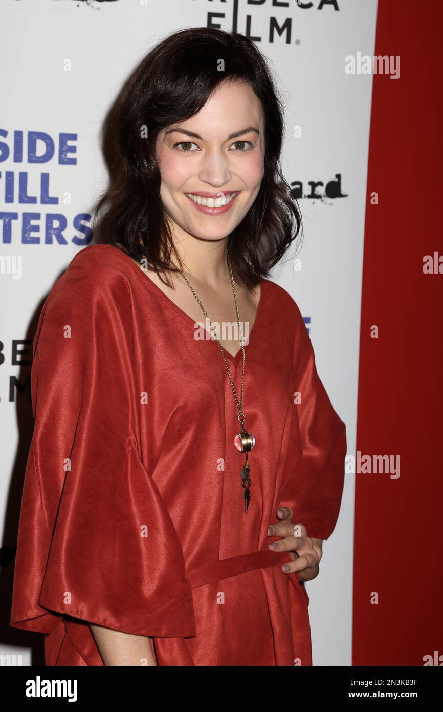 Britt Lower attends the premiere of "Beside Still Waters" at the