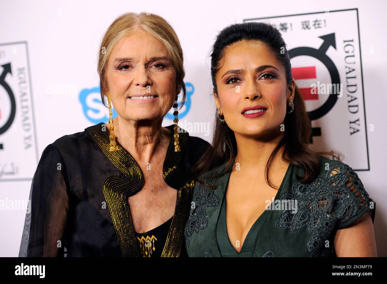 Honorees Gloria Steinem, left, and Salma Hayek Pinault pose together at