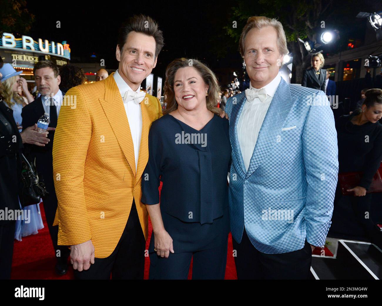 Jim Carrey, and from left, Kathleen Turner and Jeff Daniels arrive at