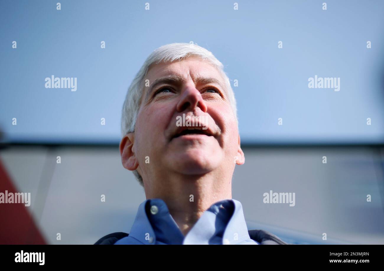Michigan Gov. Rick Snyder speaks while campaigning in Oakland Township
