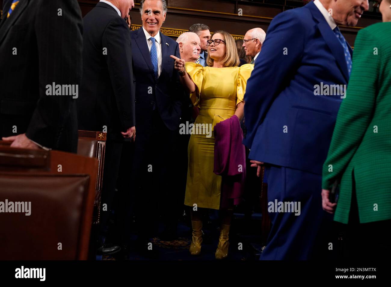 Sen. Kyrsten Sinema, IAriz., arrives before President Joe Biden