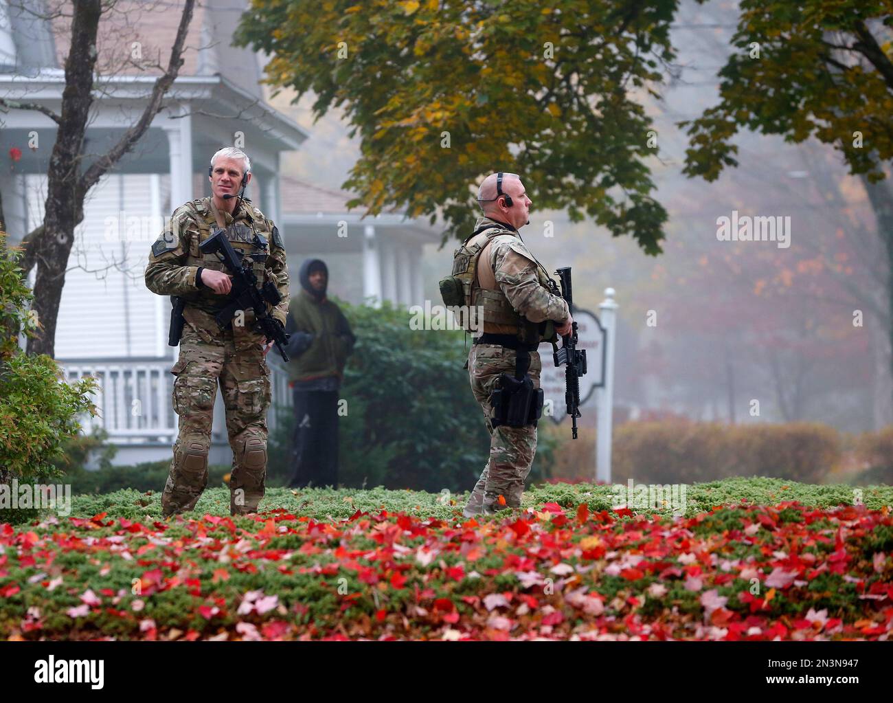 Pennsylvania State Police SWAT officers stand by as Eric Frein arrives