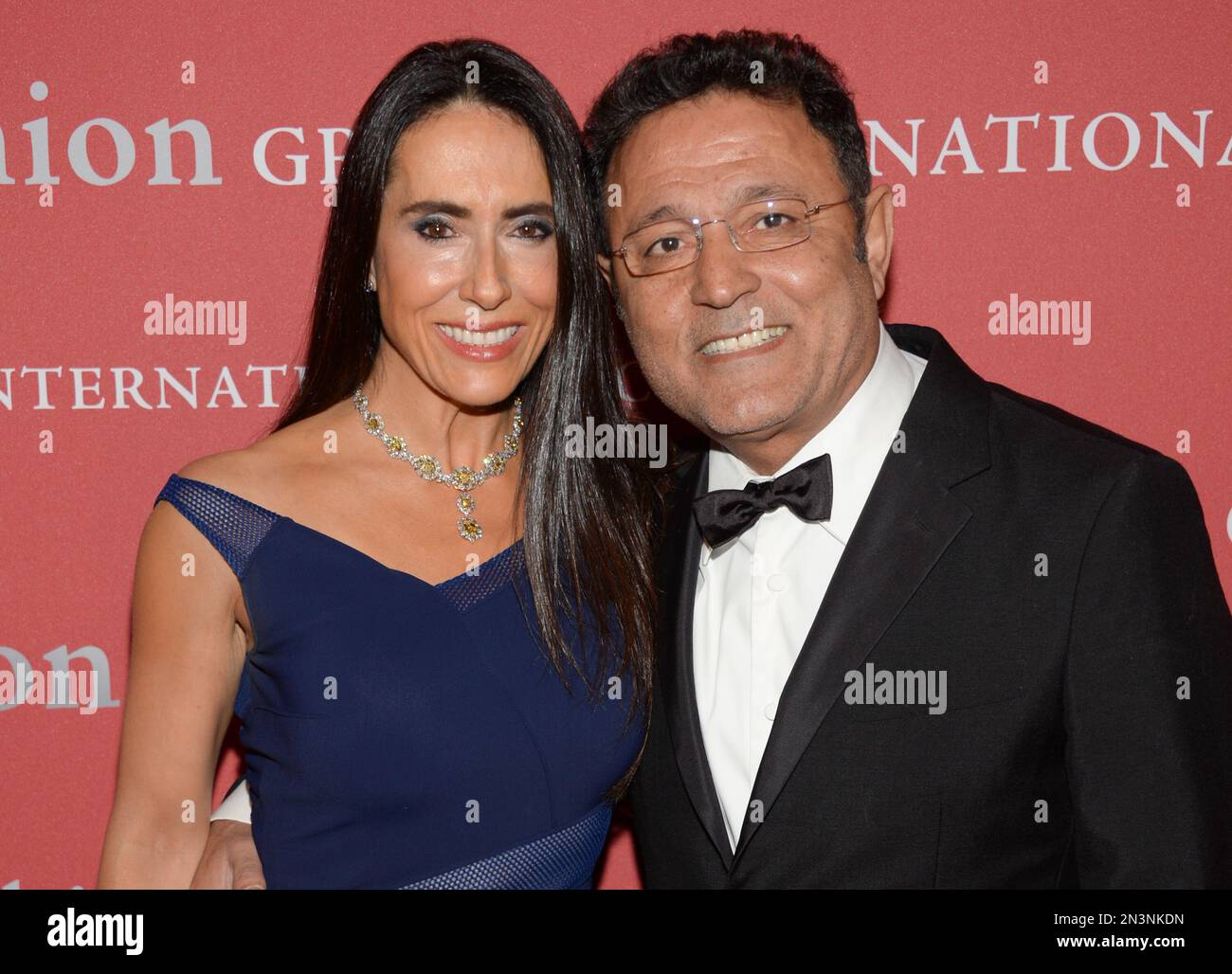 Designer Elie Tahari, right, and wife JoAnne Blessinger attend