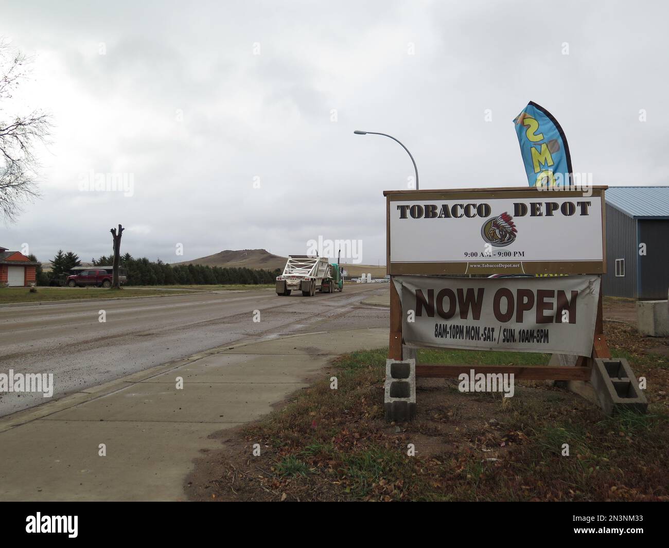 A sign for a tobacco store is seen in the small oil patch town of Alexander,  N.D. in this Oct. 28, 2014 photo. The town's main drag used to see about  13,000