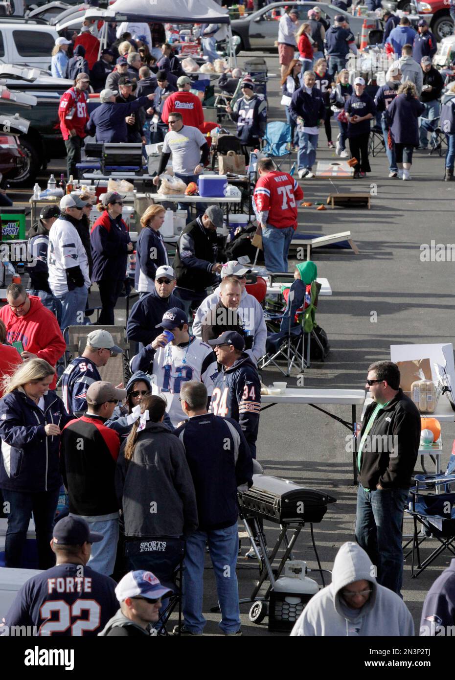 Fans spend time tailgating in the Gilllette Stadium parking lot before