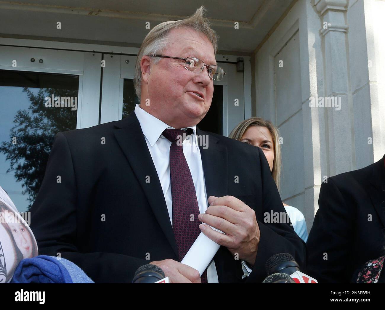 Okfuskee County District Attorney Max Cook. talks to the media on the