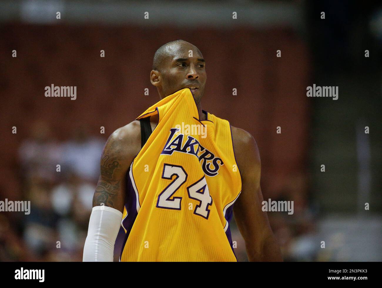 Kobe Bryant of the Los Angeles Lakers bites his jersey during a