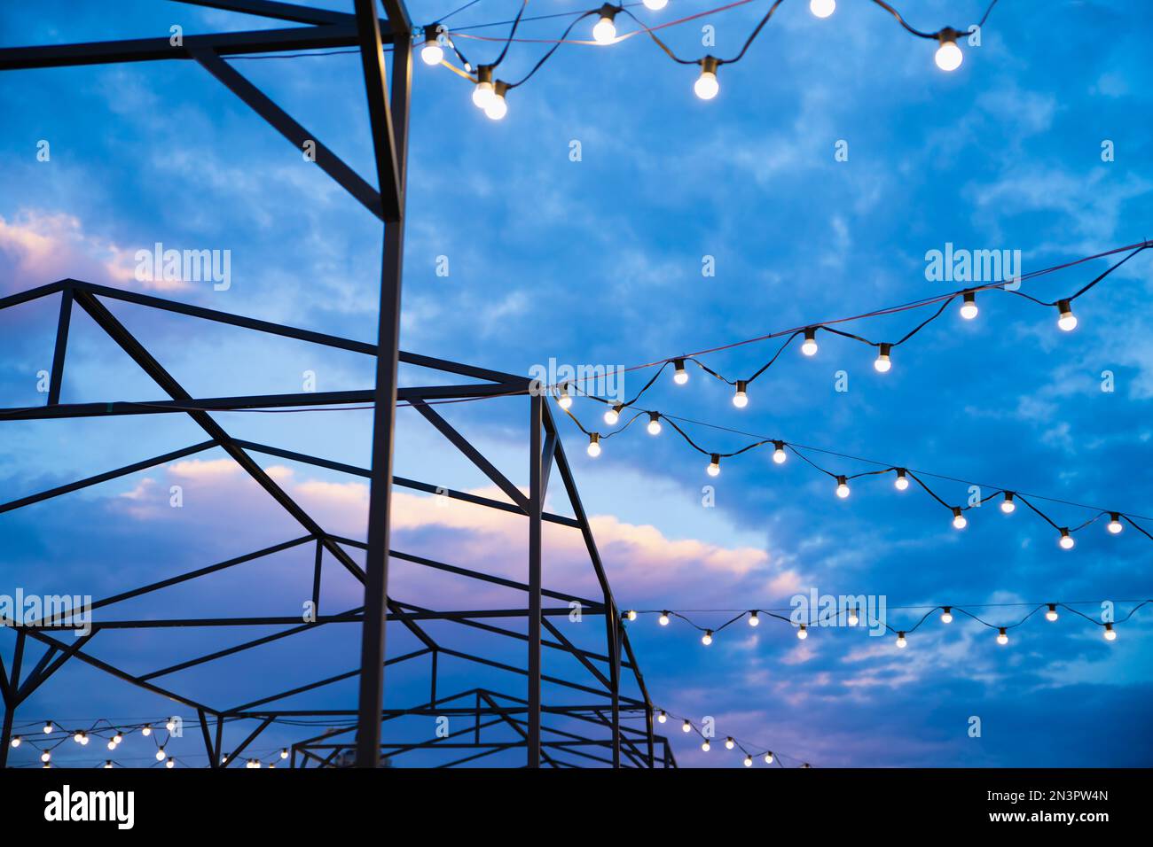 String of light bulb decorations and awning structures for outdoor