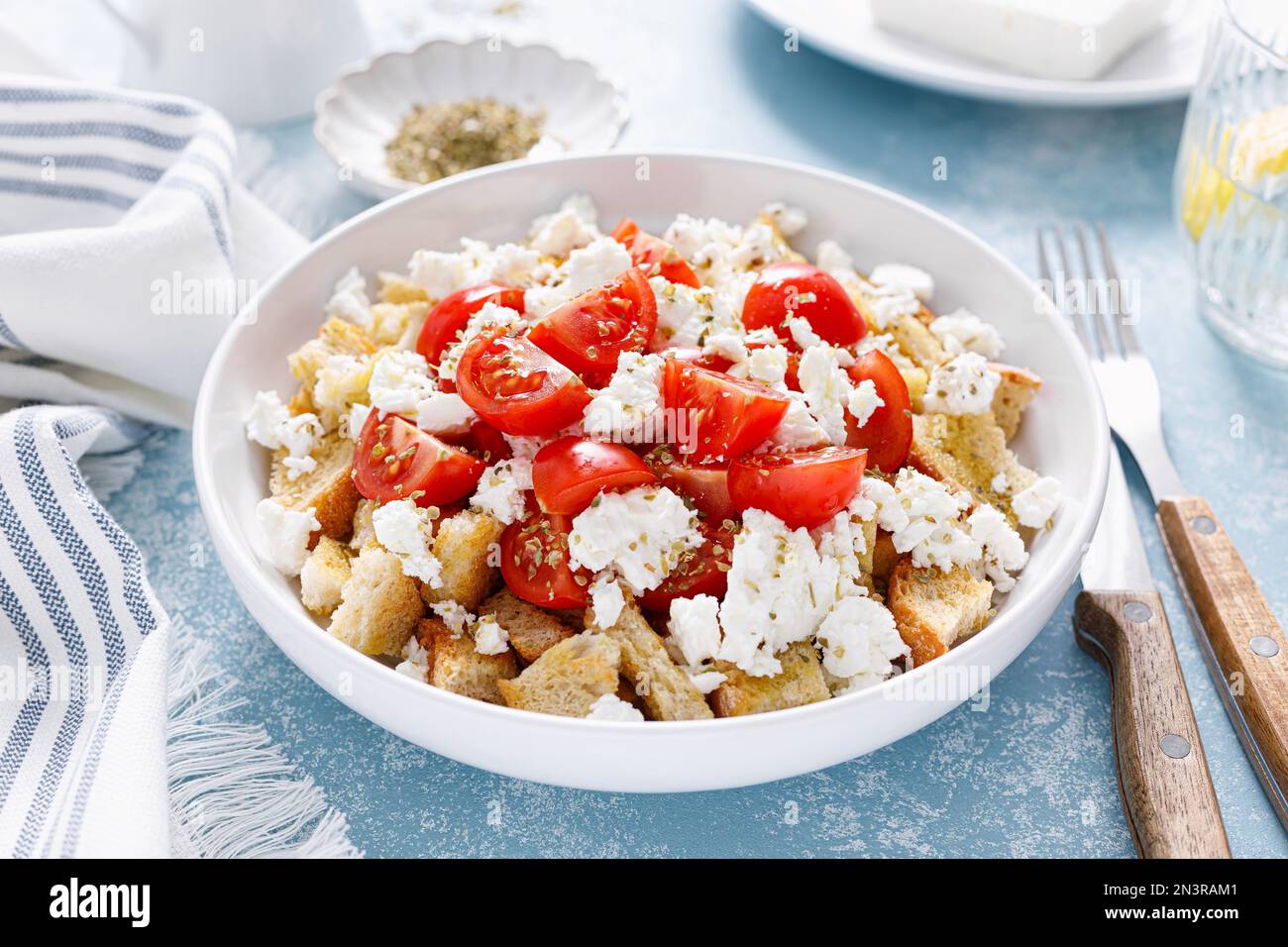 Dakos or koukouvagia salad. Classic recipe Cretan barley rusk salad ...