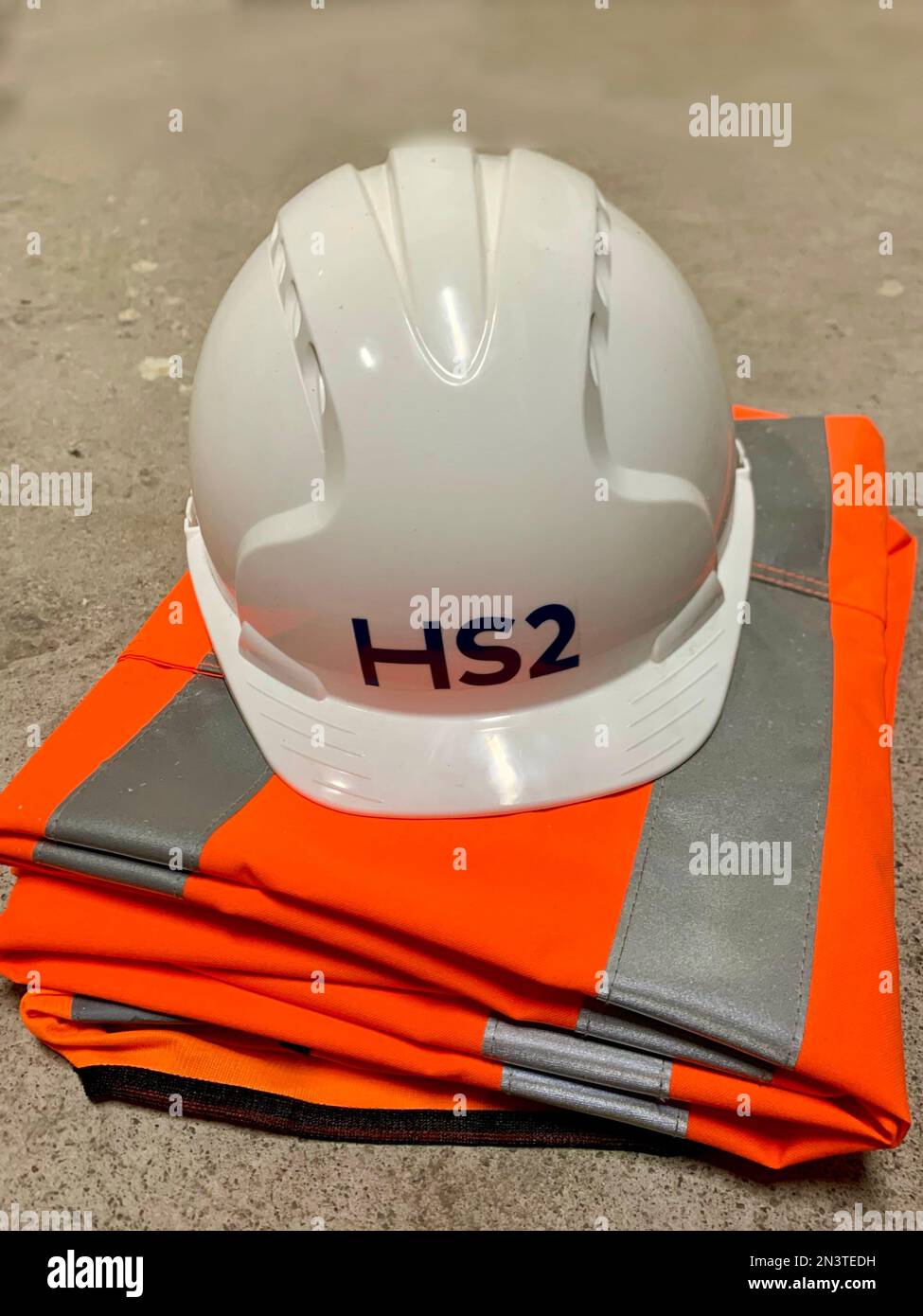 Construction hard hat and overalls for HS2 high speed train line, IK Stock Photo