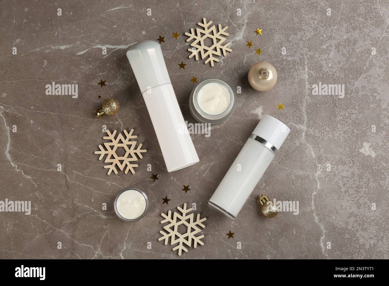 Flat lay composition with different cosmetic products on grey table ...