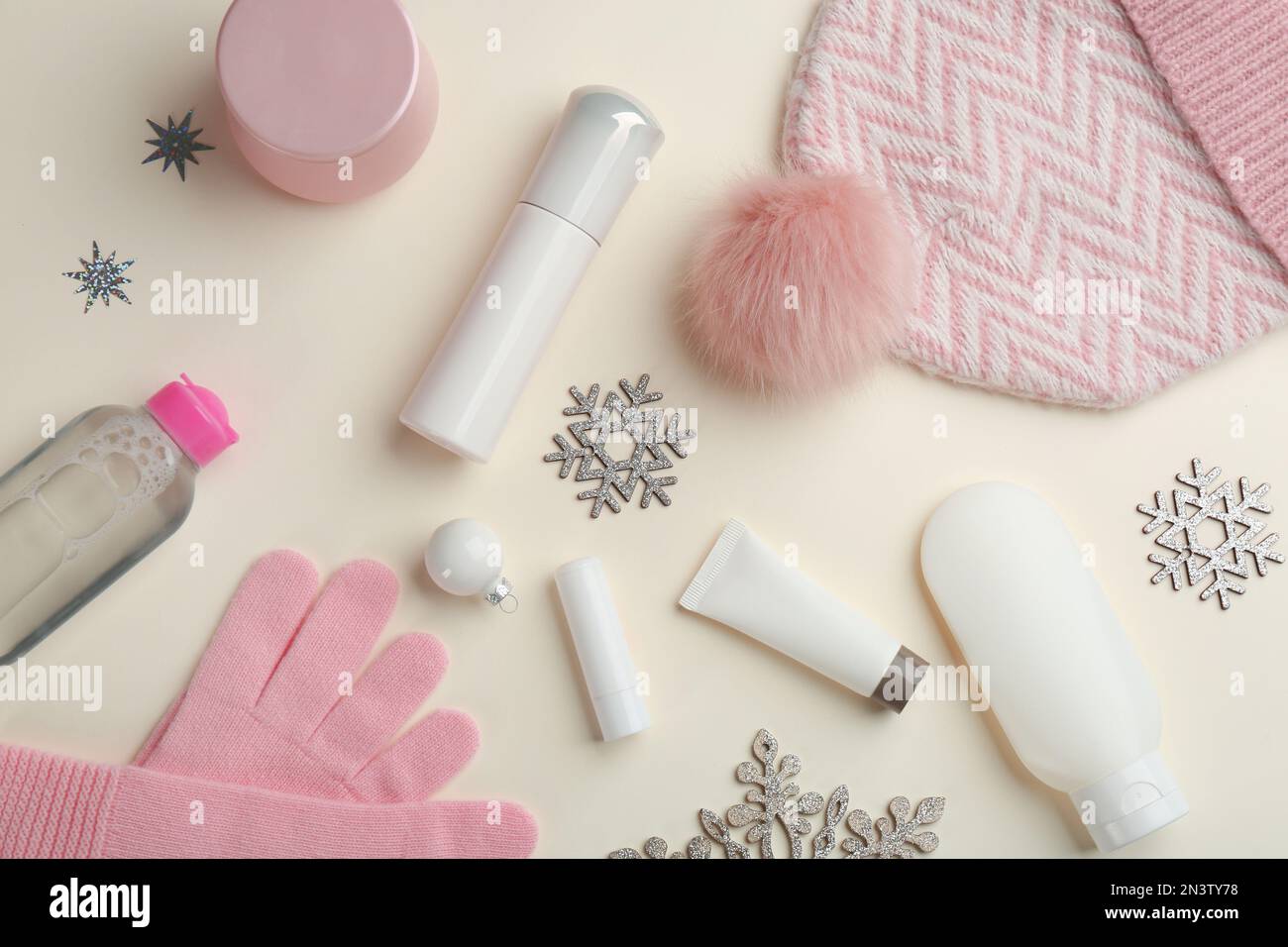 Flat lay composition with different cosmetic products on beige ...