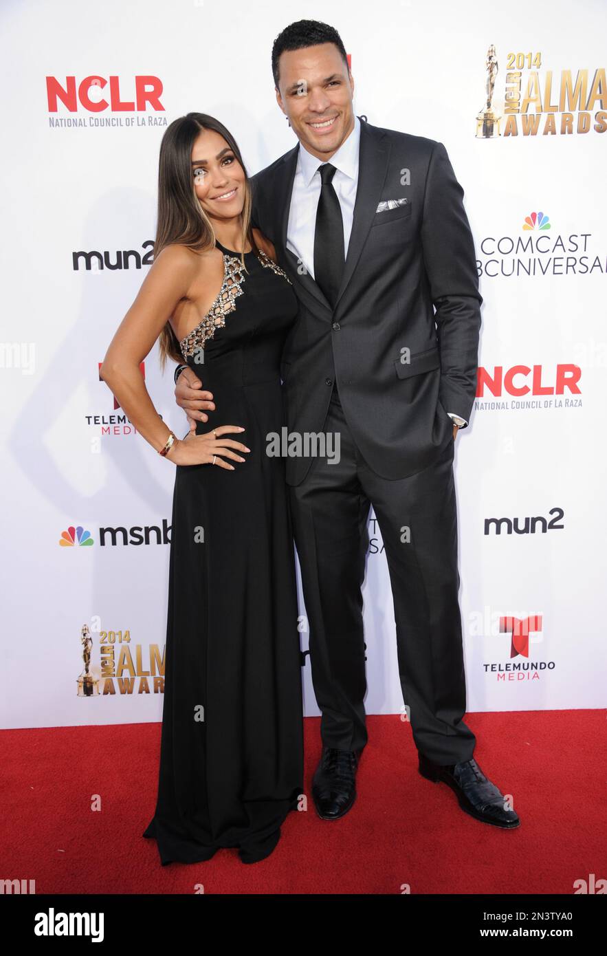 October Gonzalez, left, and Tony Gonzalez arrive at the NCLR ALMA