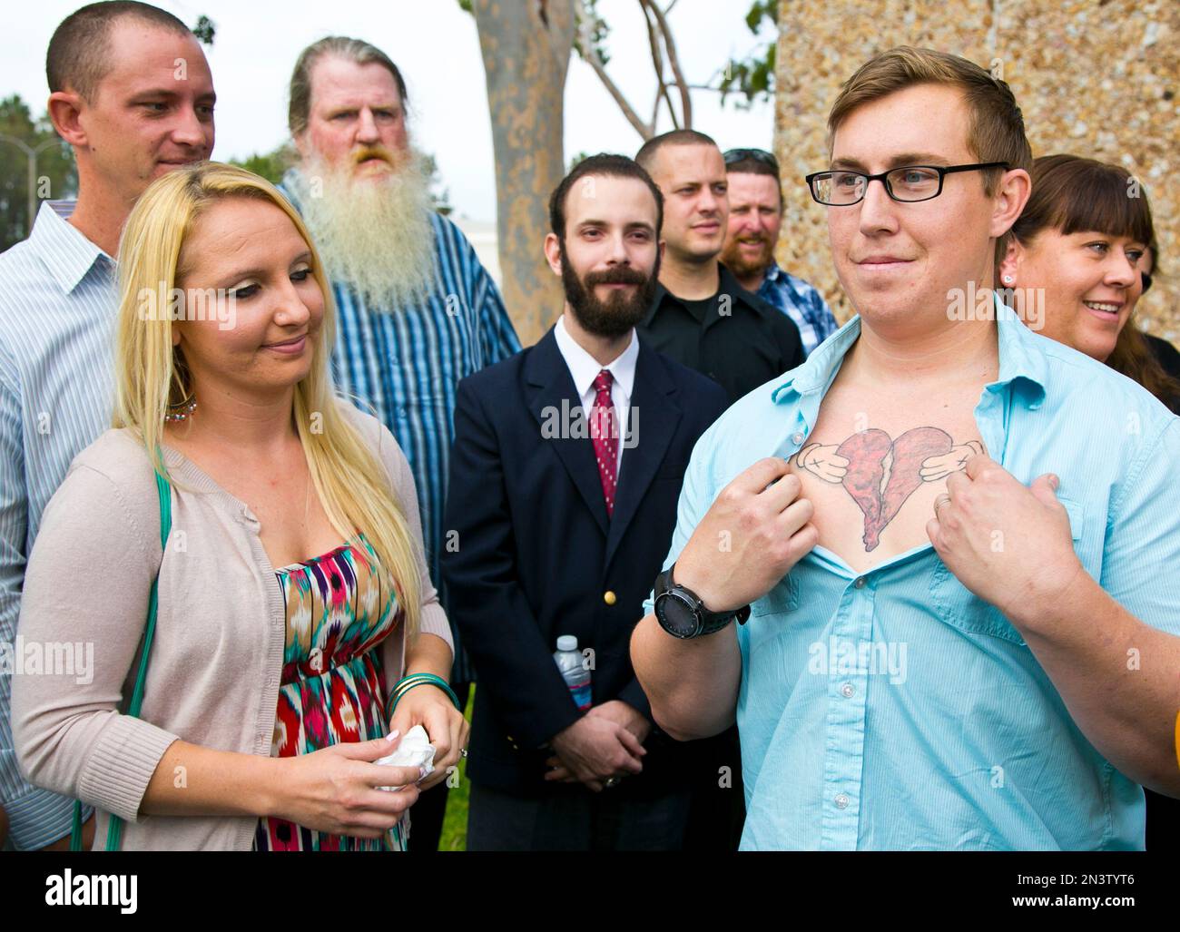 Donald Besch, 25, right, the son of Susan Mellen, who has little memory