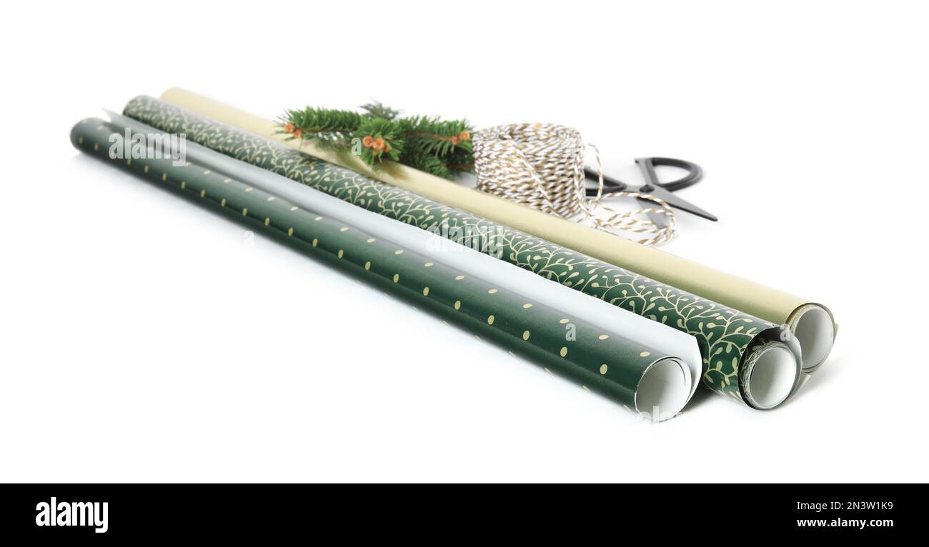 Wrapping Rope On Cardboard Wrapping paper rolls, rope, fir branches and scissors on white ...