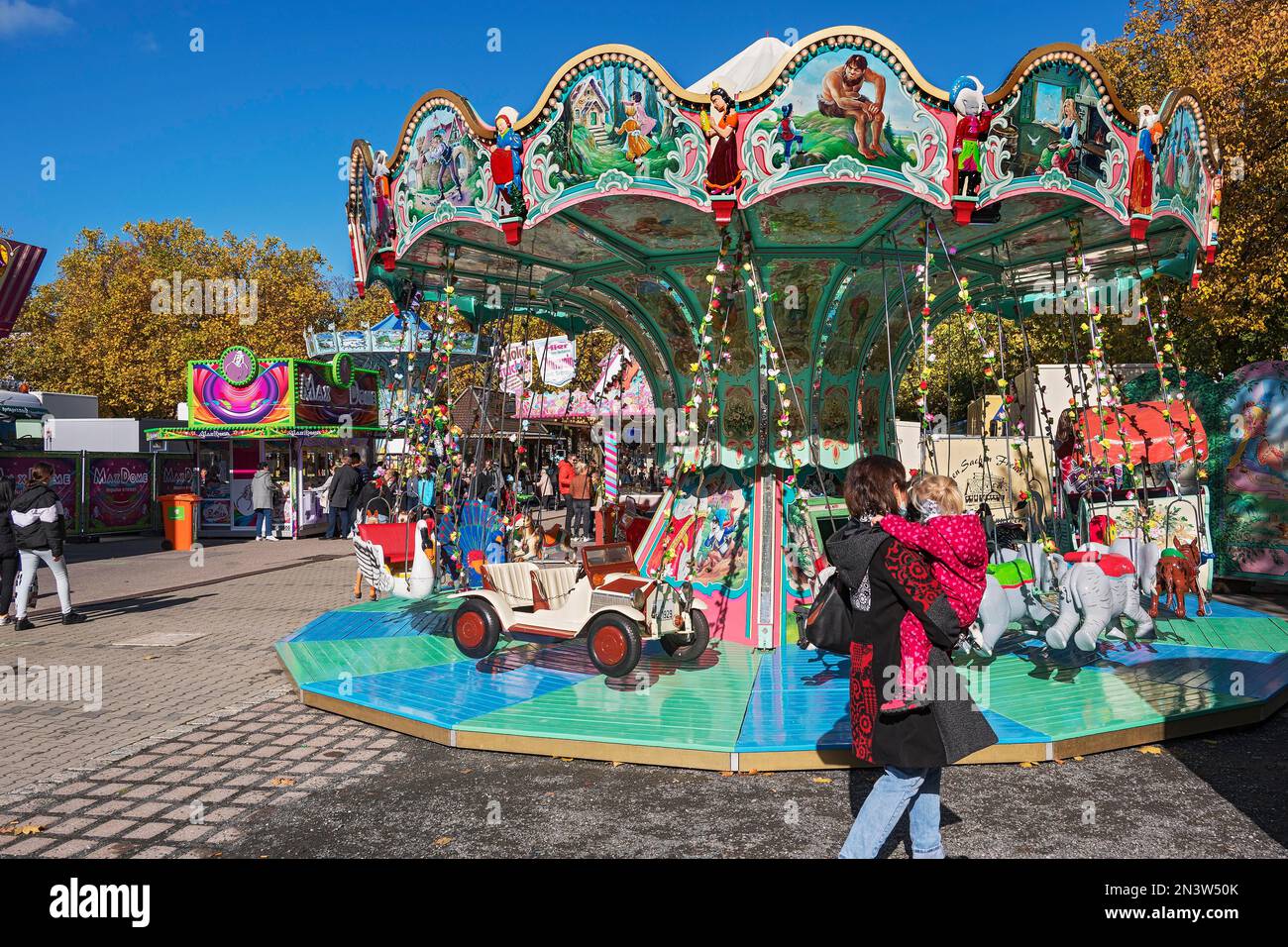 Children's carousel, amusement ride, Kathreinermarkt, Kempten, Allgaeu, Bavaria, Germany Stock Photo