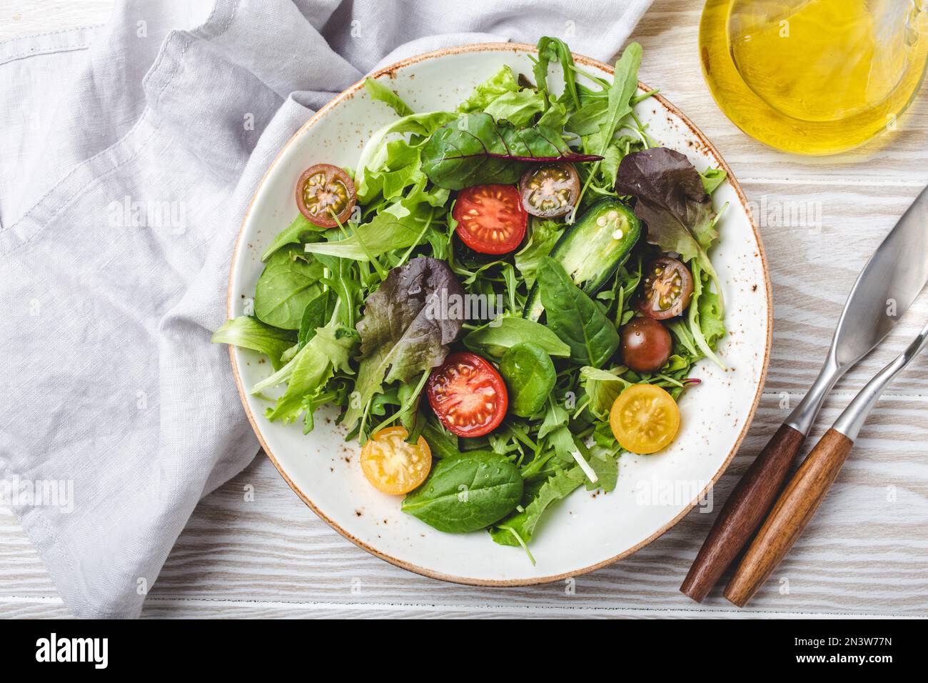 Vegetables vegetarian healthy salad with red yellow cherry tomatoes ...