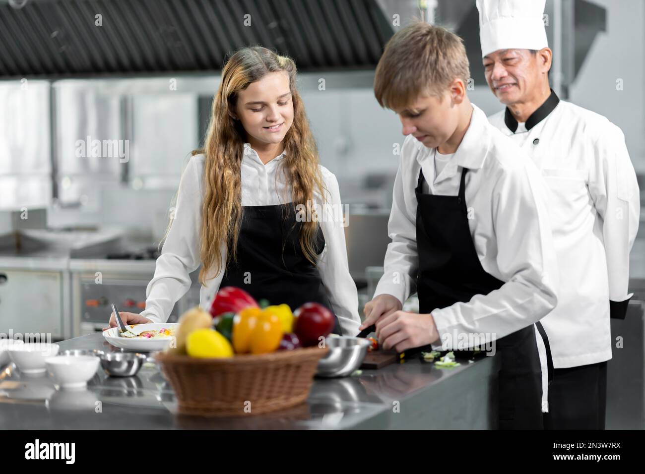 Students are learning to cook in a culinary institute with a standard ...