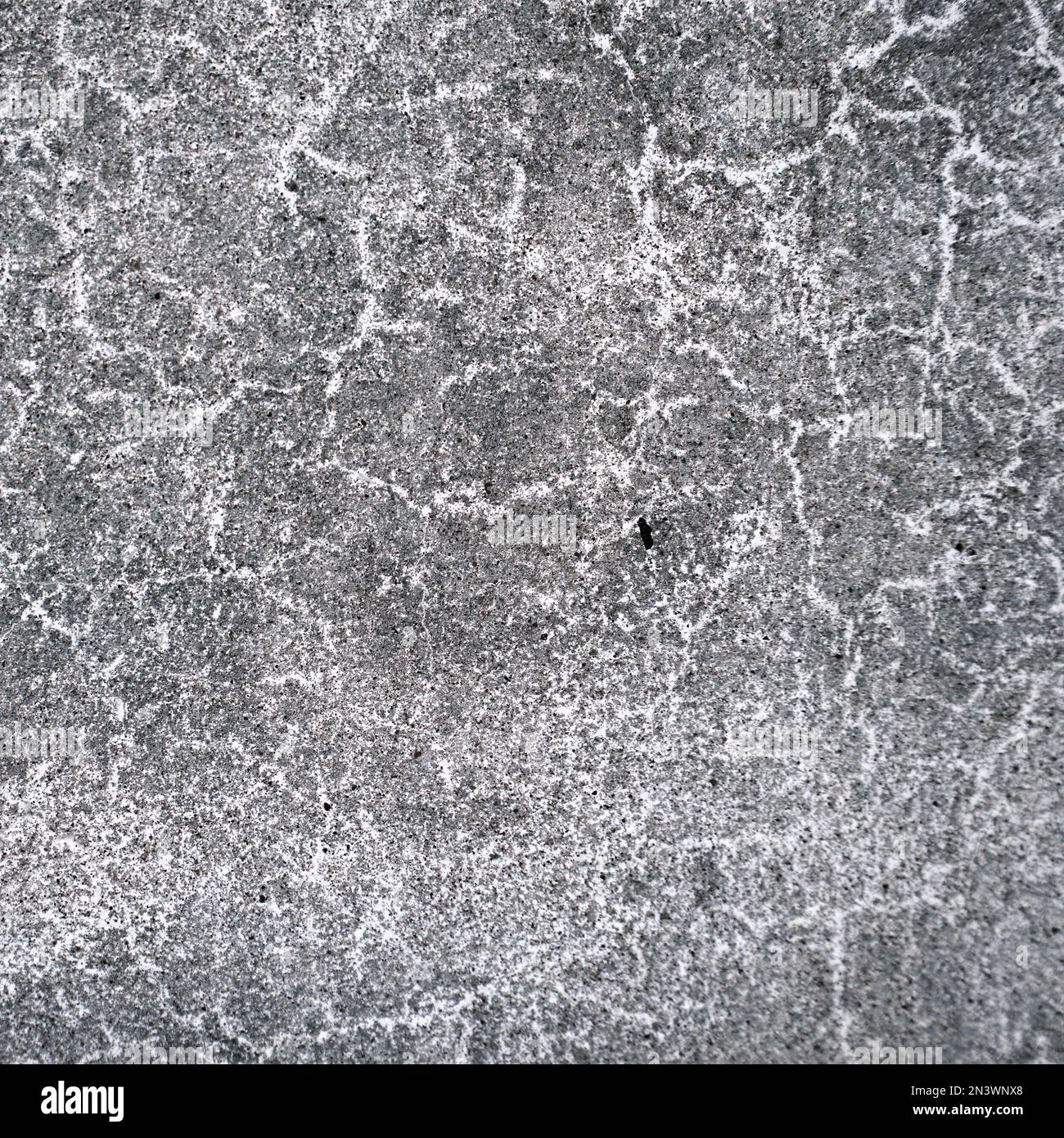 Old concrete wall with abstract cracks. Soft focus Stock Photo