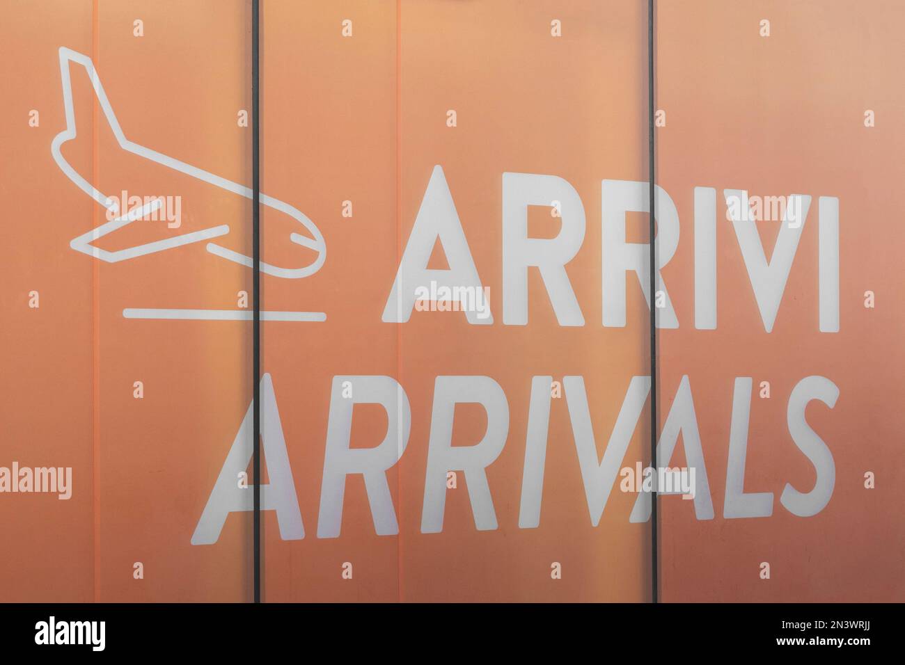 The sign in the arrivals area of an Italian airport Stock Photo